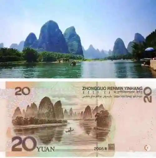 在它的背面,也就是桂林山水图案的正中,有一个孤舟蓑笠的渔夫,正手执