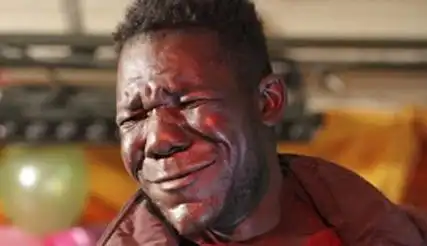 津巴布韦男子当选丑陋先生 欲靠长相丑赚钱(图)