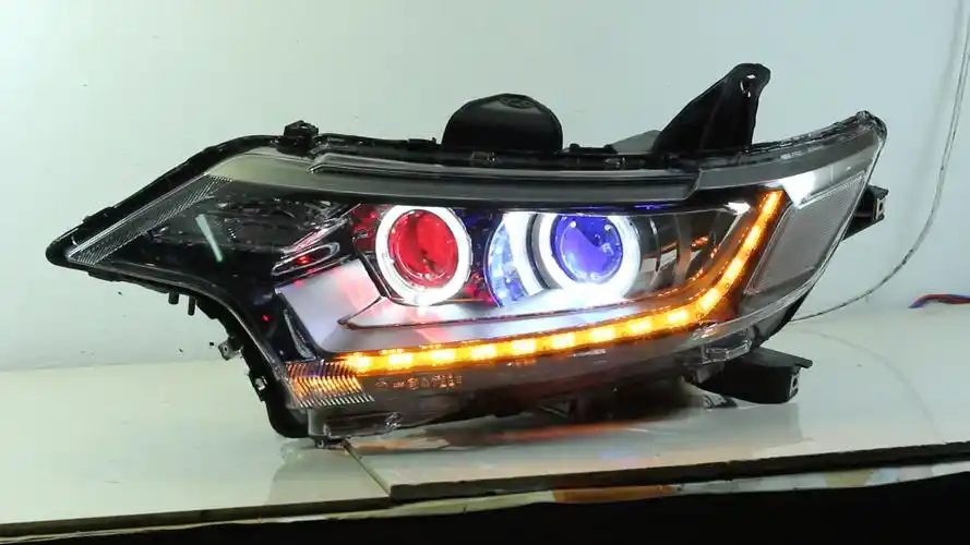 18款三菱欧蓝德大灯总成改装led双光透镜七彩恶魔眼日行灯