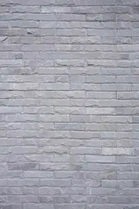 无缝白色图案的装饰灰色石板石材墙面的现代风格设计,装饰不均匀裂缝