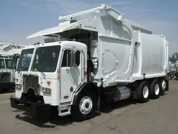 2008 peterbilt 320 with new way front loader garbage truck