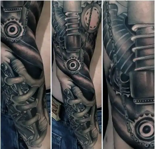 刚强有力的男性生物机械齿轮花臂纹身图案2
