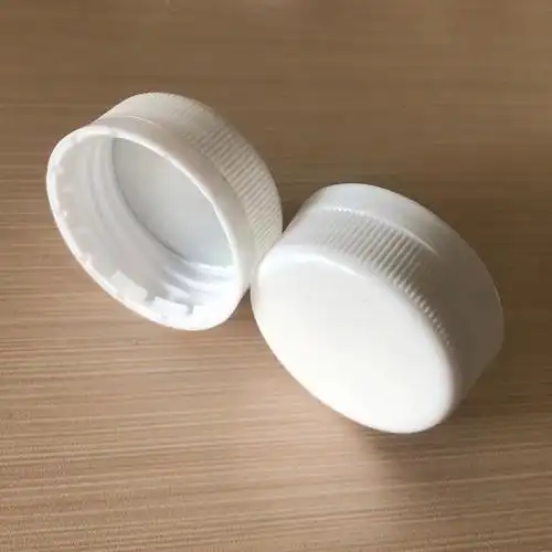 工厂直销38牙白色蕾丝塑料盖 日化包装瓶盖通用塑料盖子pe发泡铝