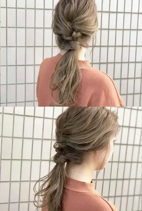 最后整理不够蓬松的头发,并将发尾烫卷,营造自然婉约的效果.