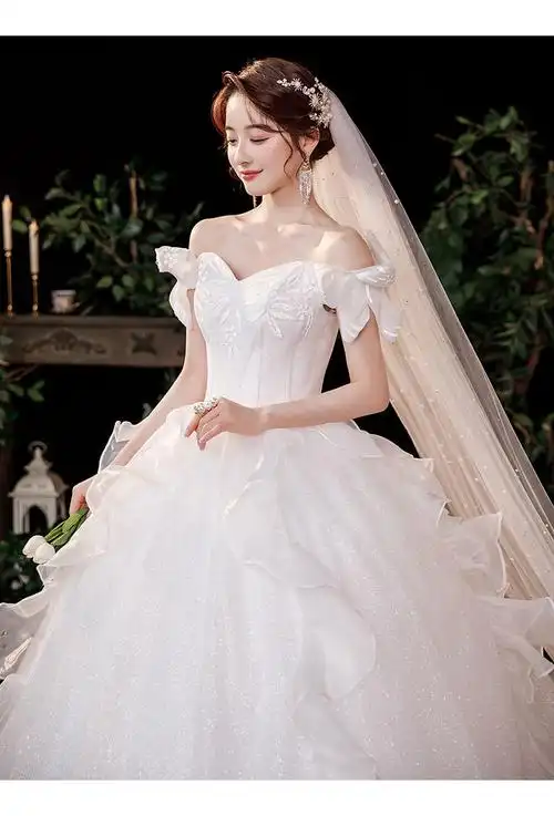 主婚纱2022新款夏季新娘气质森系拖尾一字肩森系简约超仙梦幻星空白色