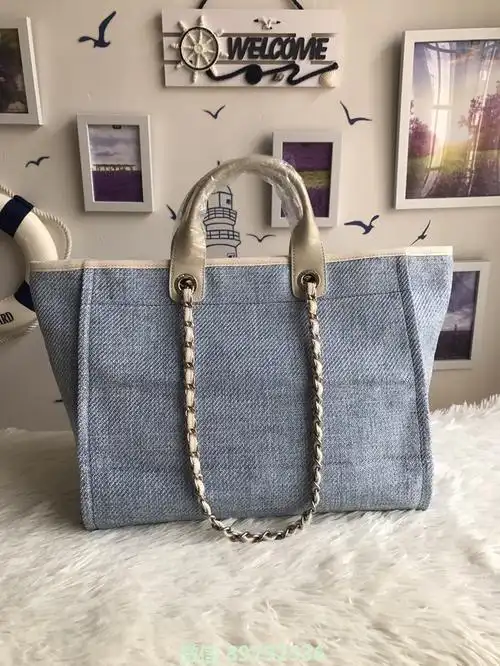 此款是原单春夏竹藤帆布包 任何细节对版布料,对版刺绣logo,品质