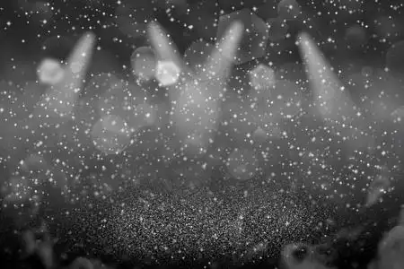 小品舞台背景可爱的闪亮灯光散焦舞台聚光灯博克抽象背景与火花飞