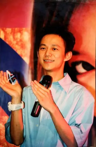 摄影师又有机会参加了何炅主持的一个活动,并在现场给他拍摄了照片