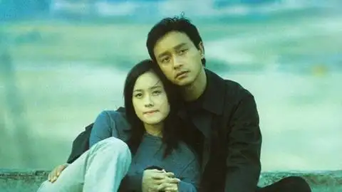 是和林嘉欣主演的恐怖片《异度空间》,2003年11月,为了表彰张国荣对于