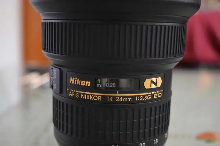 【图片10】新手在苏宁自营购买尼康14-24,发现保卡,后盖等有疑问,求