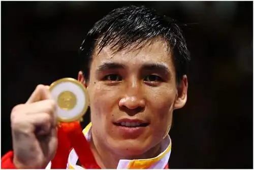 奥运冠军张小平曾完胜重量级梅威瑟,打造kok拳赛助推中国拳击