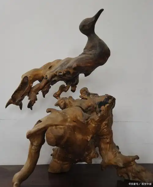 根雕如何打磨抛光上油根雕是一种古老的艺术形式,其原材料是各种树根