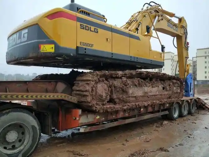 咨询:吉安到商洛山阳县特种爬梯车拉挖掘机运输