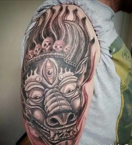 公牛头纹身 男生大臂上恐怖的公牛头纹身图片