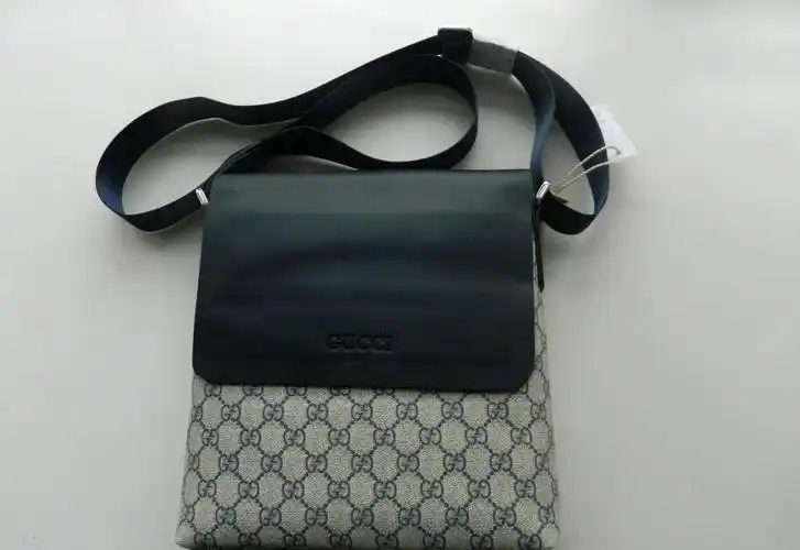 2013新款 酷奇男包 休闲时尚包 单肩斜跨包