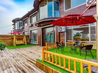 鲅鱼圈绿岛温泉别墅轰趴馆,可烧烤ktv唱歌.室内外超大泡池,麻将室