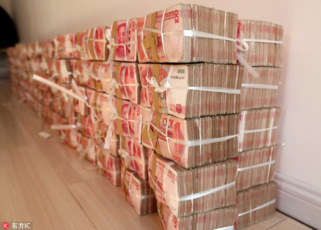 沈阳警方成功侦破一起特大非法传销案件查扣涉案现金364亿元人民币5