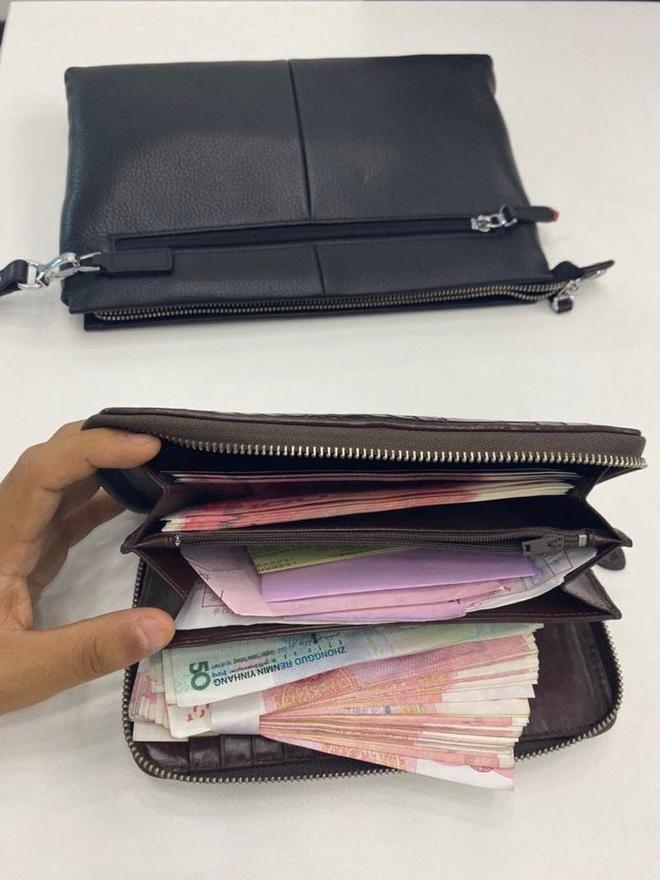 骑共享单车落了钱包包里1万多现金幸好运营小哥捡到3小时内送回