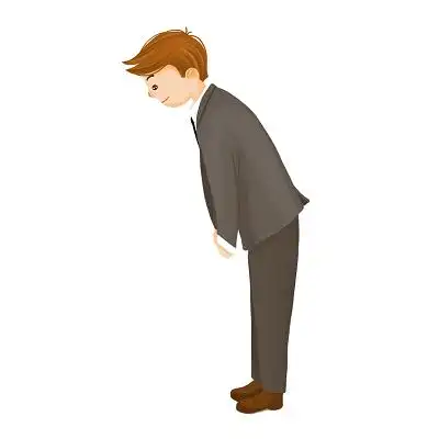 鞠躬的西装男孩