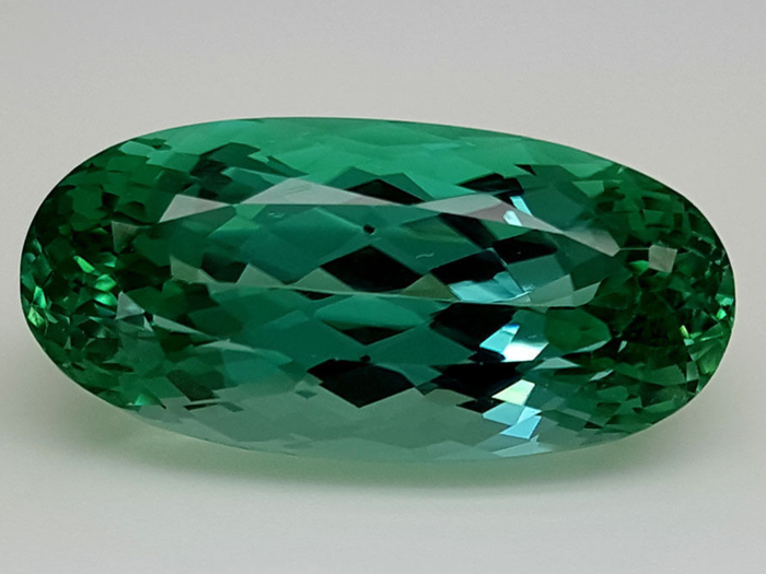 intense bluish green spodumene hiddenite - 26.35 carat