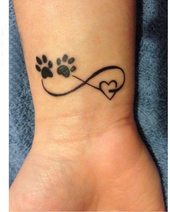 女生纹身手腕女生手腕上爪印和符号纹身图片