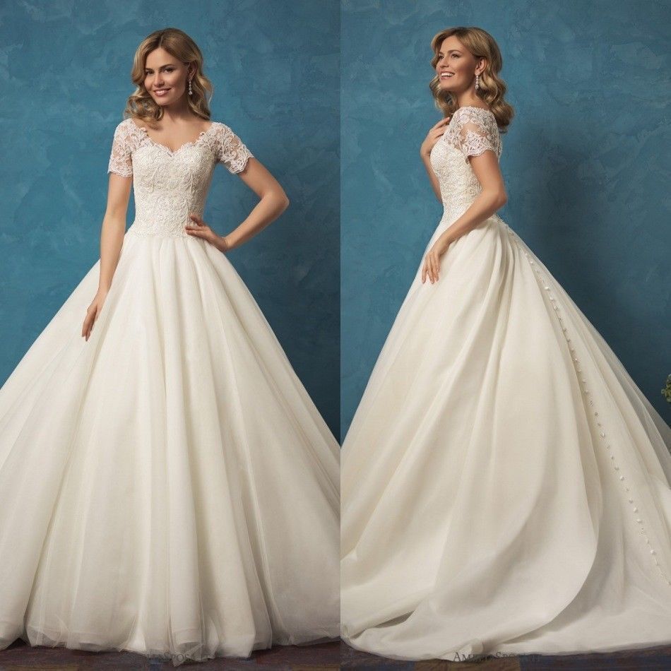 婚纱礼服2020新款新娘蕾丝短袖拖尾显瘦新娘结婚蓬裙v领婚纱包肩