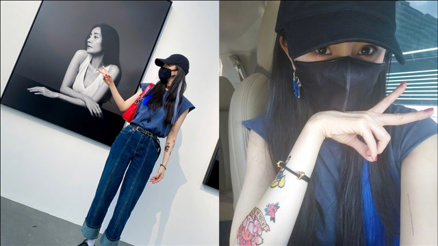 杨幂看展晒照片,手臂纹身贴抢眼