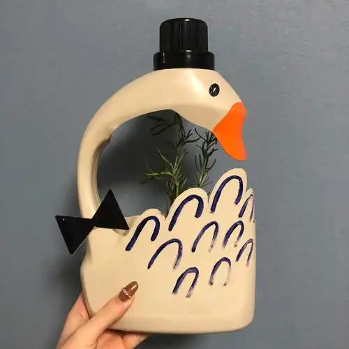 洗衣液瓶子改造花盆鹅先生00