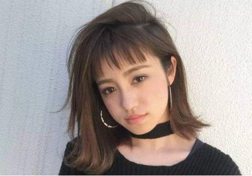 圆脸女生斜刘海齐肩发发型