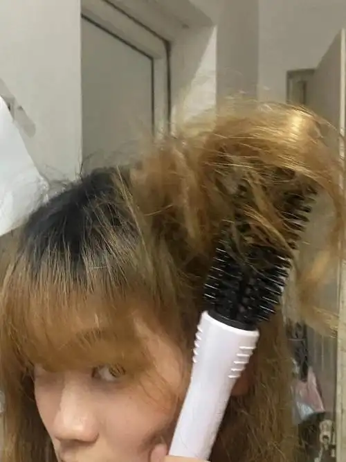 头发卷进卷发梳不要慌先拍照记录一下