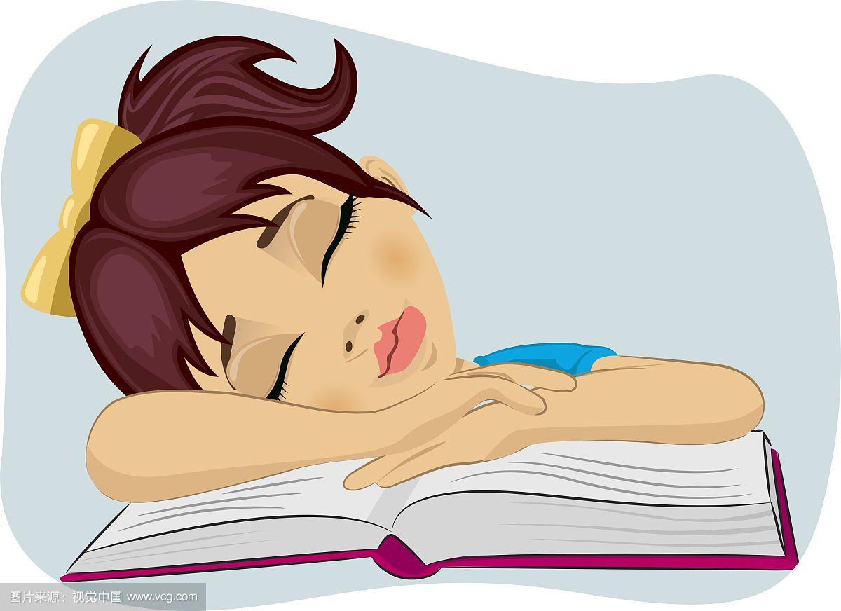 可爱的小女孩趴在书上睡着了