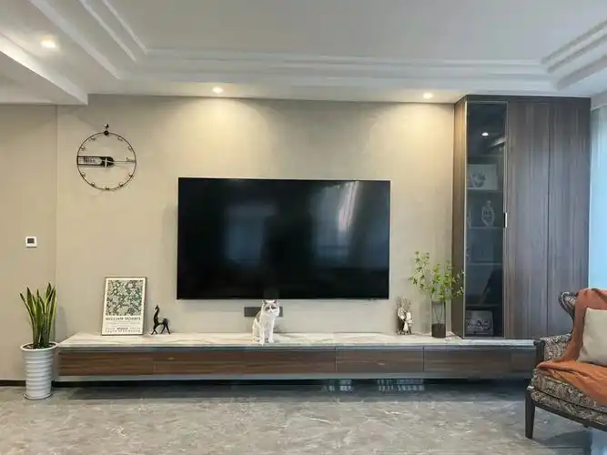 简洁风暖色调的电视背景墙及电视柜