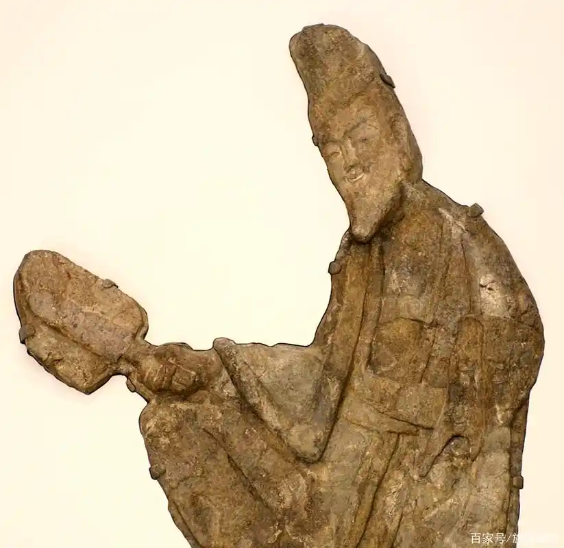 流失美国的龙门石窟北魏浮雕维摩居士坐像