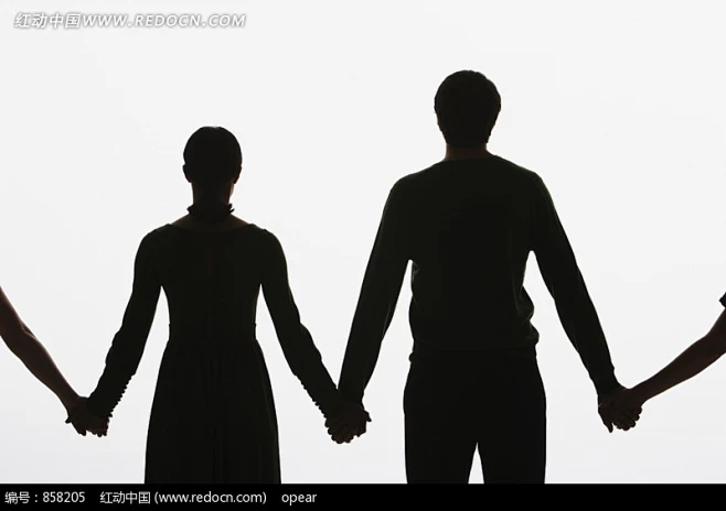 手牵手的男女剪影图片