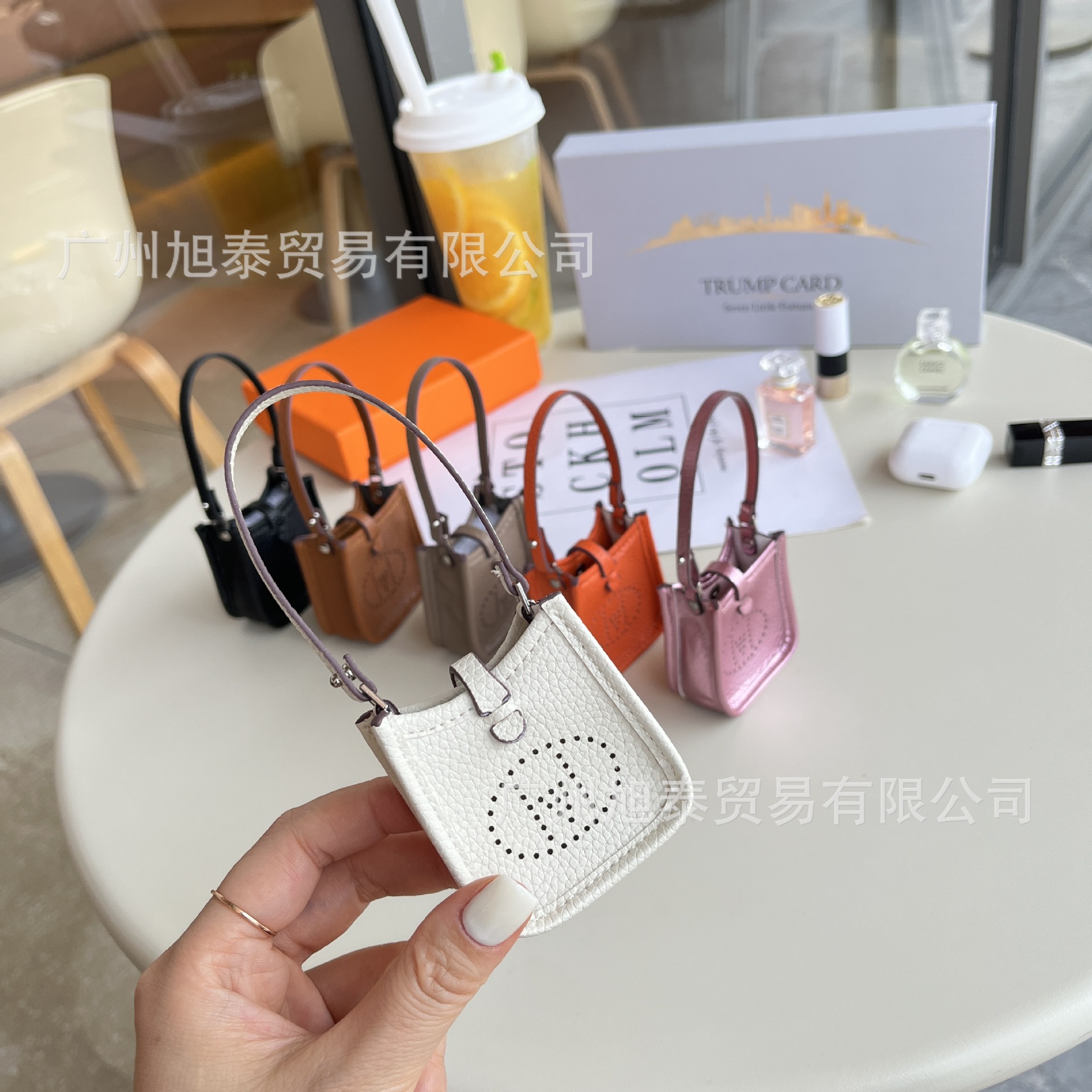 2024新款迷你小伊芙琳耳机包荔枝纹蓝牙耳机二代包包挂件跨境爆款