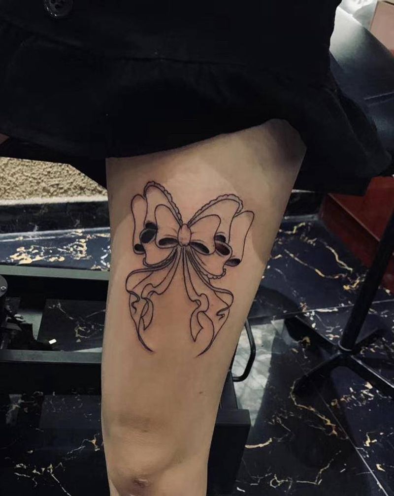 大腿蝴蝶结纹身图片_腿部纹身图案