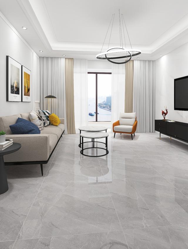 家里人相聚在客厅区域一起看电视,地砖选得高,看着这舒服的颜色,看着