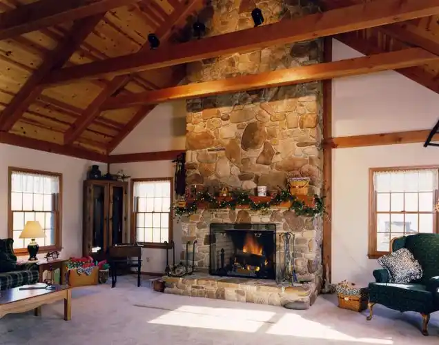 现代别墅起居室石质拼凑型壁炉设计装修效果图