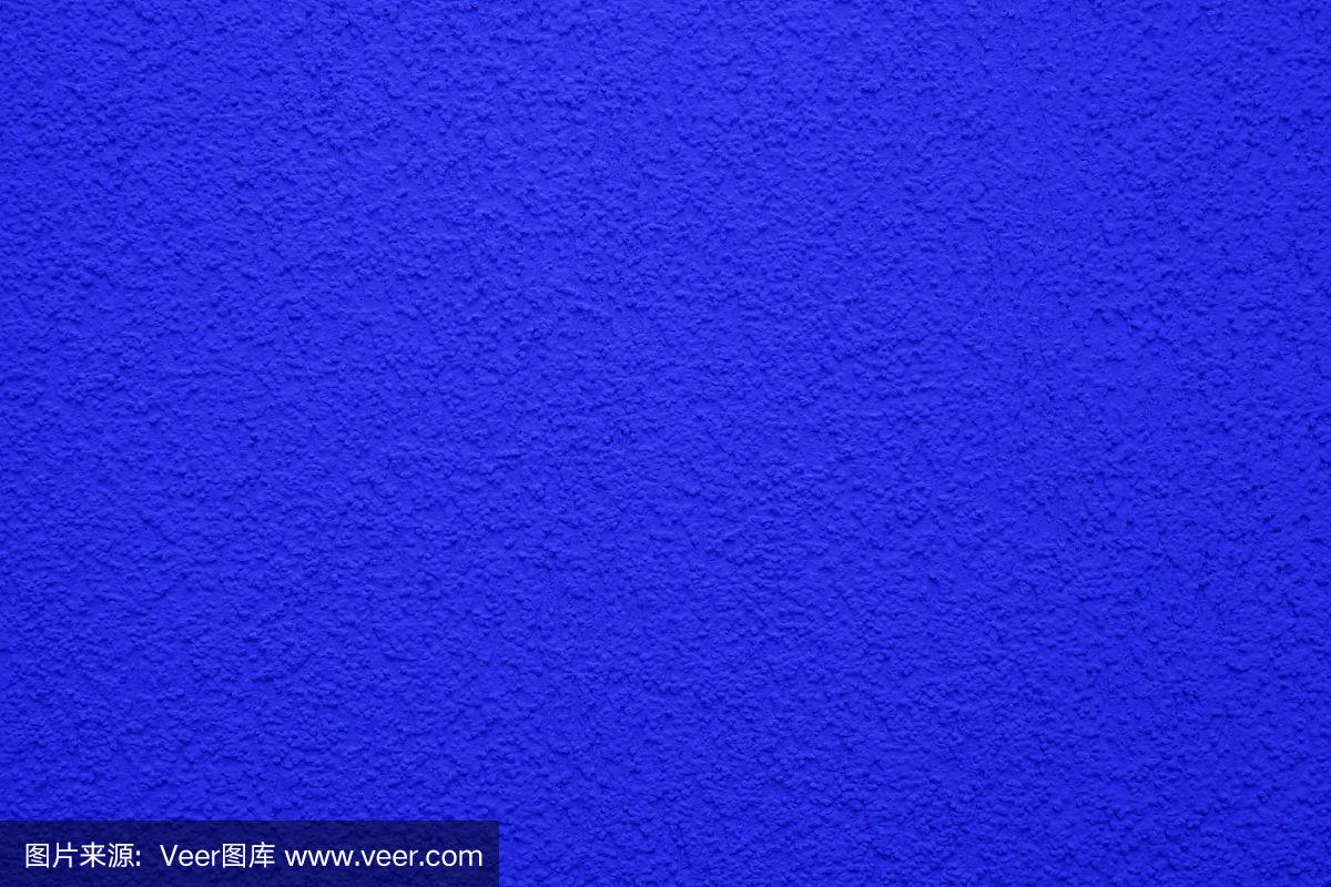 明亮,色彩丰富的混凝土墙面纹理,漆成蓝色底色.壁纸石膏.
