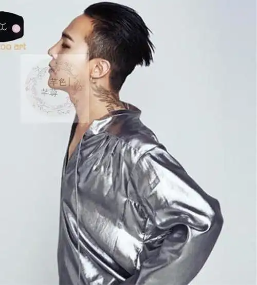 权志龙脖子纹身翅膀